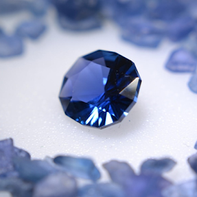 a blue sapphire on a white background